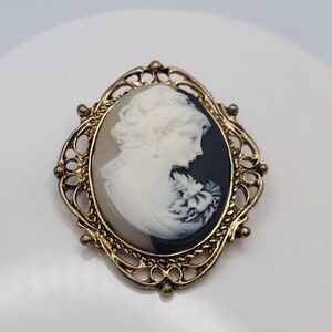 Elegant Gold and White Cameo Brooch